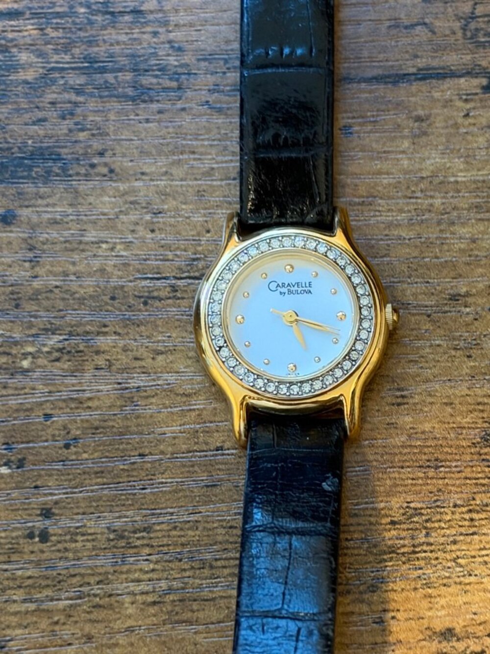 Caravelle by Bulova Women's Quartz Watch Crystal Bezel White Dial Gold Tone 25mm